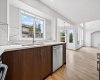 Deep window ledge - Large window over the sink with an extended ledge — perfect for plants and keeping an eye on the backyard.