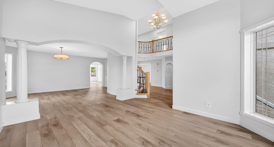 Flowing directly into the formal dining room - equally as bright with two additional tall windows.