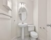 2 pc Powder Room intentionally placed next to the laundry room