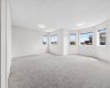 Massive primary retreat with space for a sitting area and private escape.