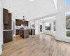Noticeable Updates include new paint, flooring, lighting, and switches throughout the home.