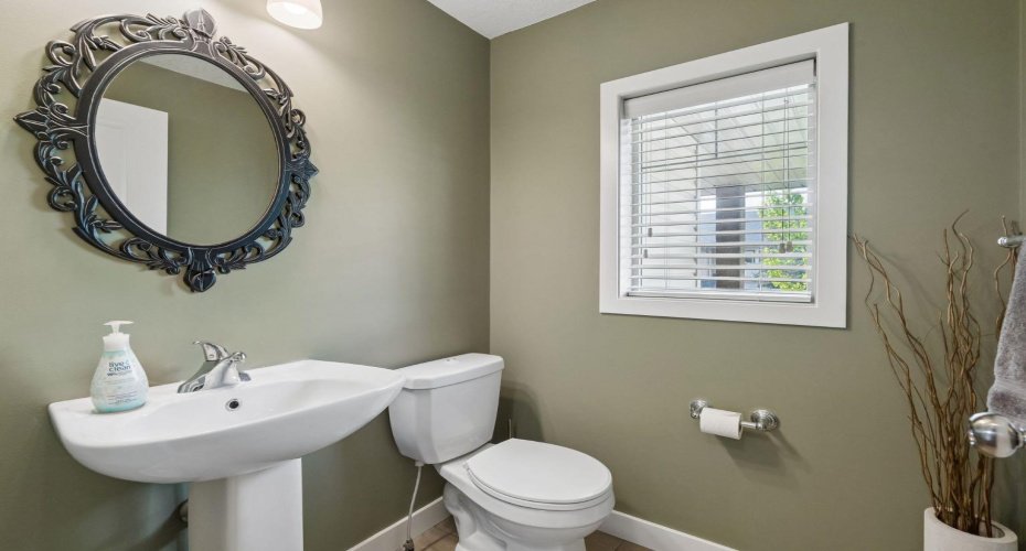 4 piece upper level bathroom, offering ample storage and counter space to keep the morning and night routines of your family feeling effortless