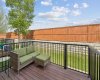 A high fence helps to keep this space feeling private