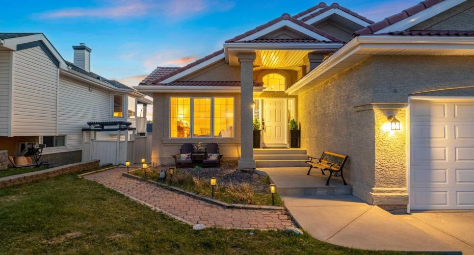 Welcome to this beautifully updated walkout bungalow in the highly sought-after community of Edgemont.