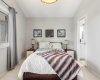 The king-size primary suite offers a private escape with vaulted ceilings, new  Low E-glass window and a large walk-in closet with organizers.