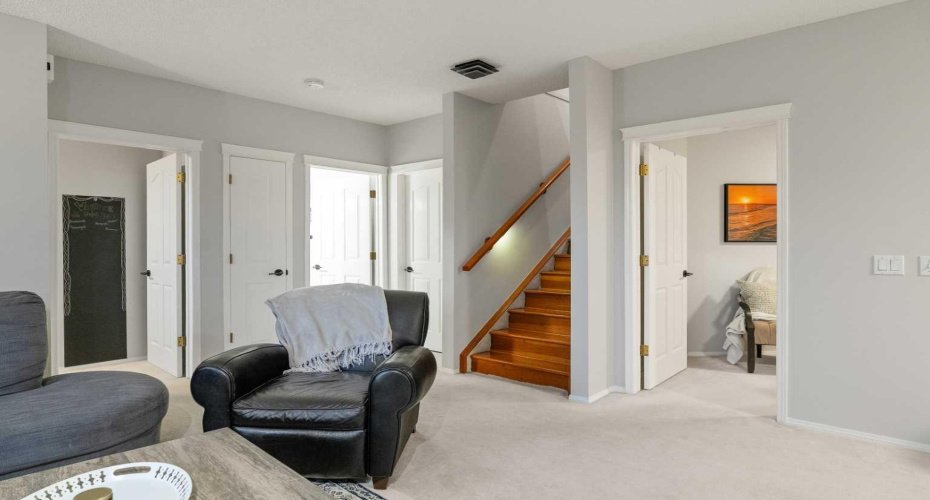 Gleaming harwood floor stairwell from main level to lower walkout level