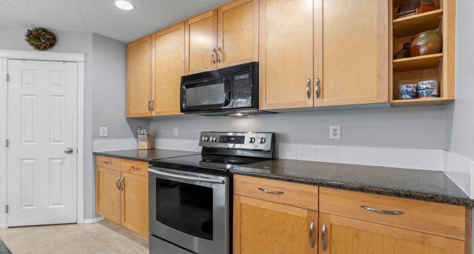 Black/stainless steel appliances for modern look