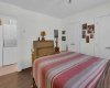 Bedroom with laundry room steps away.
