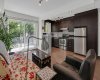 Home faces South. The large patio doors on the balcony, and the kitchen window allows the sunshine to spill in.