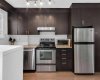 Updated kitchen is well laid out to provide loads of cabinetry, optimizing space!