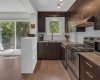 Perfect window location over the kitchen sink, looking out to 13th Avenue- home, sweet, home!