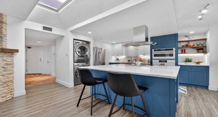 The kitchen's skylight brings in even more natural light all day