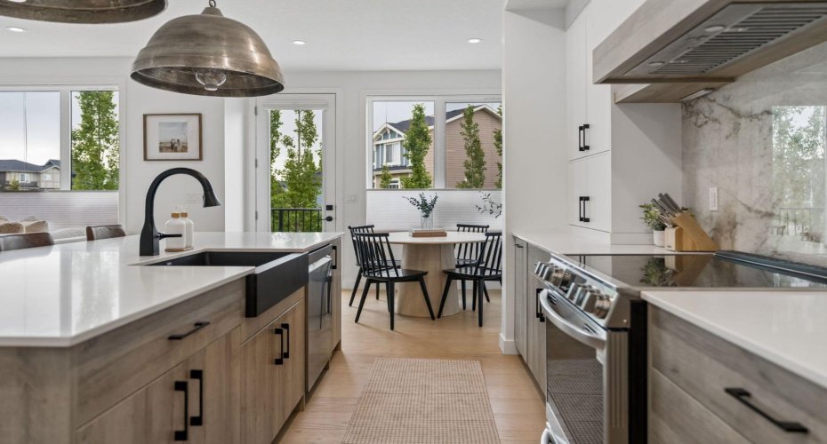 This kitchen offers ample cabinetry up and down, for more than enough storage to keep this space functioning