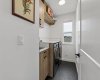 Upper floor laundry with a sink keeps life easy and convenient
