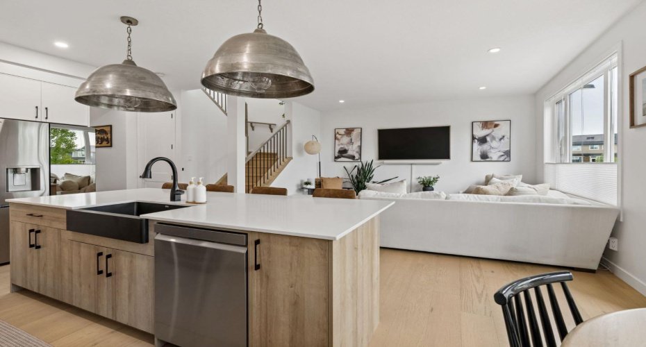 This space offers a timeless feel with the neutral woods and white walls.