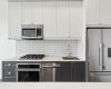 Stainless steel appliances and lots of cupboard space