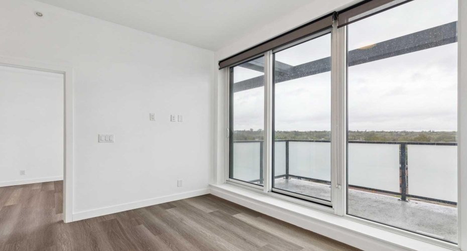 Living room looking out at private balcony