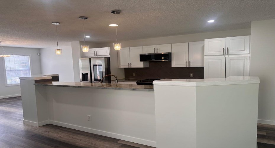 kitchen island with breakfast bar