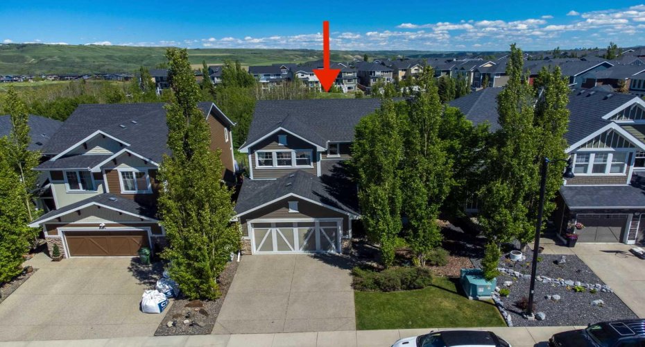 Nestled on the RIDGE in River Song this 2 Storey Walkout offers over 3,500SF of LIVING SPACE