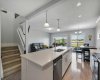 Kitchen island with Quartz counters.
