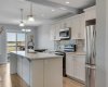 White shaker-style cabinetry.