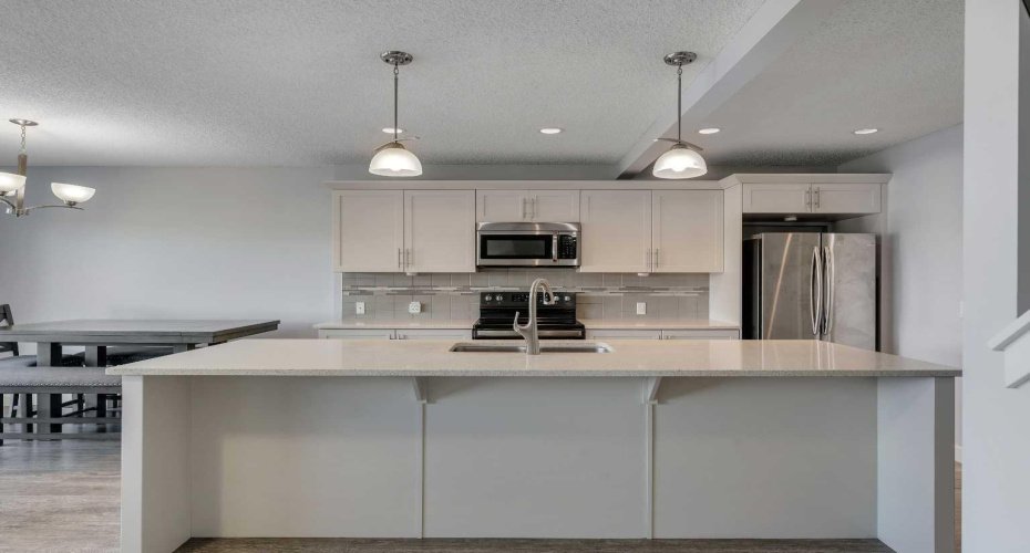 Stainless-steel appliances in the kitchen.