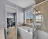 Ensuite has a soaker tub & walk-in shower.