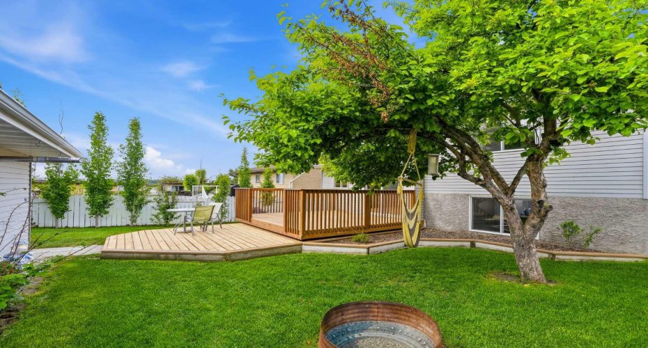 Large backyard with fire pit