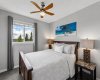 Create a comfortable retreat for family and friends in this inviting guest bedroom. Bright and airy with a large window and calming finishes, it provides the perfect space for visitors to feel right at home.
