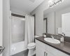 Designed with both style and functionality in mind, this upper level full bathroom features modern finishes, generous counter space, and a clean, contemporary aesthetic that serves family members and guests with ease.