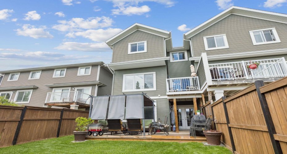 Enjoy the best of indoor-outdoor living with a spacious upper deck, covered lower patio retreat, and beautifully maintained yard. The home's functional outdoor layout creates space for entertaining, relaxing, and making the most of every season.