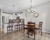 From casual breakfasts to special occasions, this dining space is perfectly positioned to bring people together. The seamless connection to the kitchen makes serving and entertaining effortless, while the open layout encourages conversation long after the meal has ended.