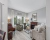 Settle into a space designed for slowing down and enjoying the moment. Large windows fill the living room with natural light, while the fireplace creates a warm focal point for cozy evenings, morning coffee, or quiet weekends at home.