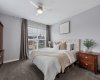 End each day in the comfort of your own private retreat. Spacious and filled with natural light, the primary bedroom offers a peaceful atmosphere designed for rest and relaxation, with plenty of room to create your ideal sanctuary.
