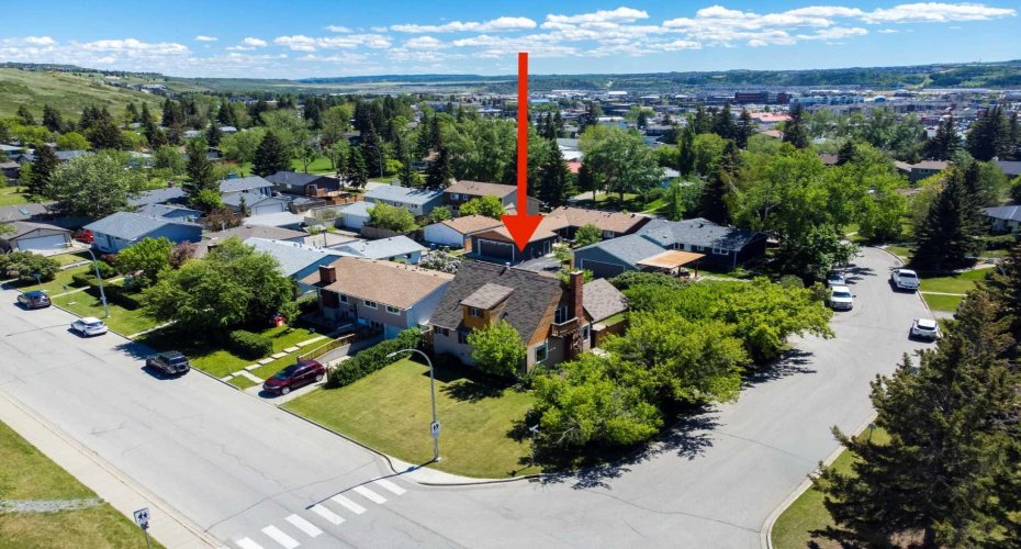 Nestled on a large corner lot bordering the Tri Schools