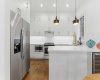 Kitchen with Cabinets to the Ceiling