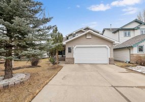 704 Woodside Drive, Airdrie, Alberta T4B2G9, 5 Bedrooms Bedrooms, ,4 BathroomsBathrooms,Residential,For Sale,Woodside,A2321781