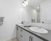 Primary ensuite with double vanities.