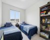 secondary bedroom upstairs, perfect for kids or guests alike.