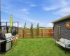 Fully landscaped and fenced extended yard.
