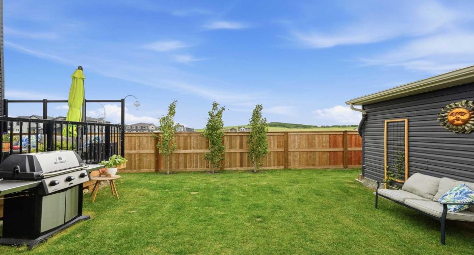 Fully landscaped and fenced extended yard.