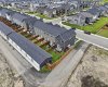 paved alley way with access to detached oversized double garage.