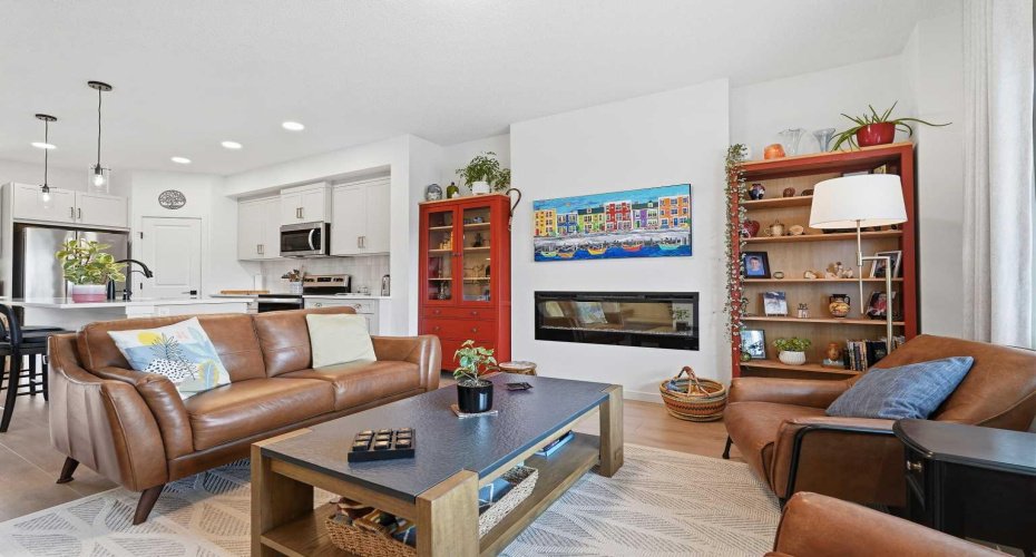 Bring and spacious living room, with electric fireplace and wired for TV mount