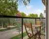 surrounded by mature trees, offering privacy and a relaxing outdoor retreat.