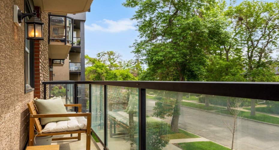 surrounded by mature trees, offering privacy and a relaxing outdoor retreat.