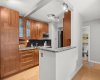 Bright and functional kitchen featuring warm cabinetry