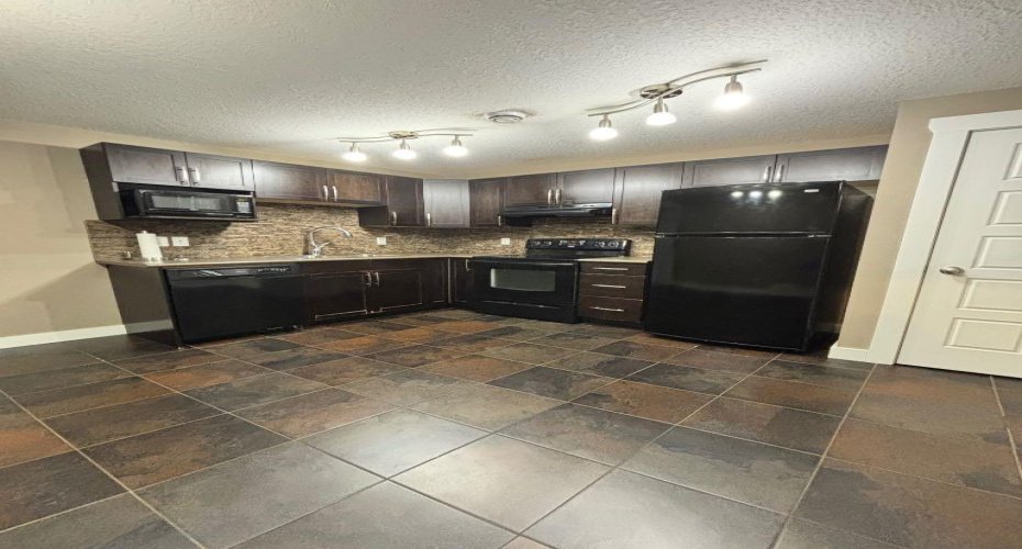 11570 76 Avenue, Grande Prairie, Alberta T8W 0B6, 5 Bedrooms Bedrooms, ,3 BathroomsBathrooms,Residential,For Sale,76,A2323095