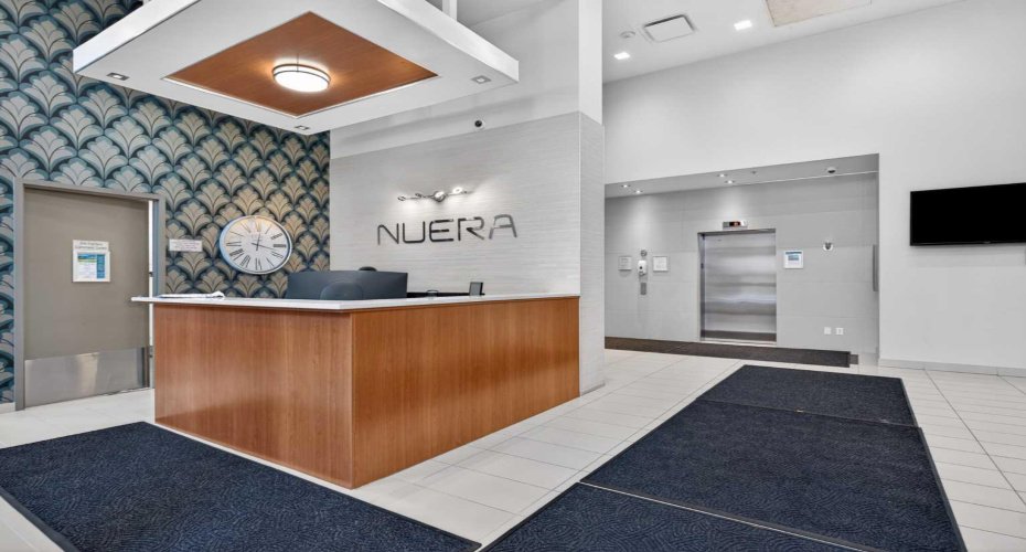 Nuera Lobby -- Inside Building Main Entrance with Concierge Desk on Main Floor