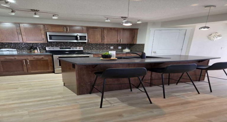 1346 Kings Heights Way, Airdrie, Alberta T4A 0R9, 3 Bedrooms Bedrooms, ,3 BathroomsBathrooms,Residential,For Sale,Kings Heights,A2323731