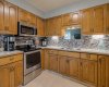 94 Elm Crescent, Lethbridge, Alberta T1K 4X1, 5 Bedrooms Bedrooms, ,3 BathroomsBathrooms,Residential,For Sale,Elm,A2316871